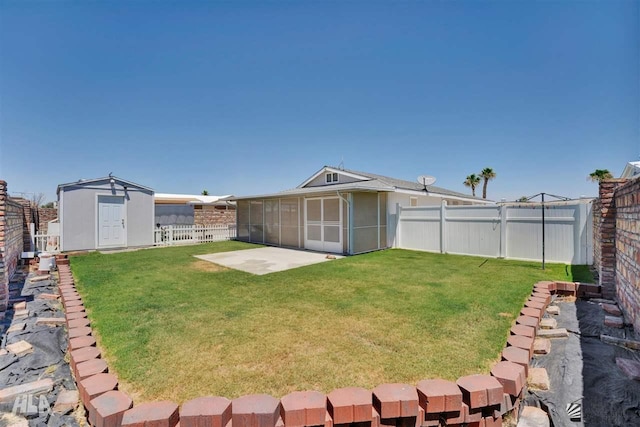 view of yard featuring a sunroom and a patio