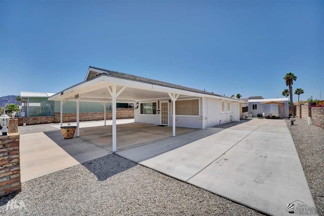 exterior space featuring a carport