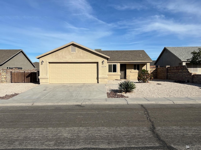 single story home with a garage