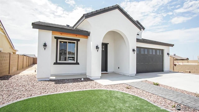 view of front of house with a garage