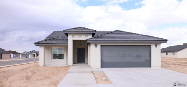 view of front of property with a garage