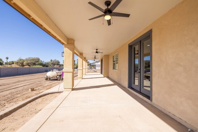 view of patio / terrace featuring ceiling fan