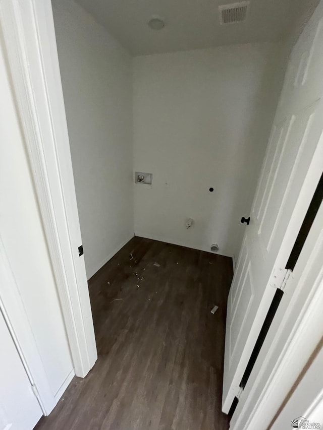 laundry room with hookup for a washing machine and dark wood-type flooring