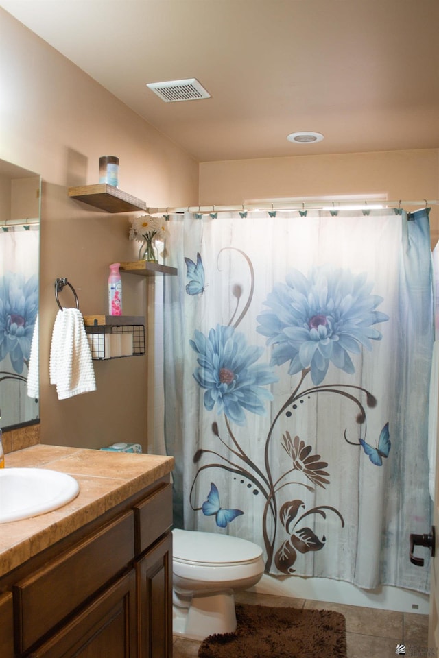 full bath featuring tile patterned flooring, visible vents, curtained shower, and vanity