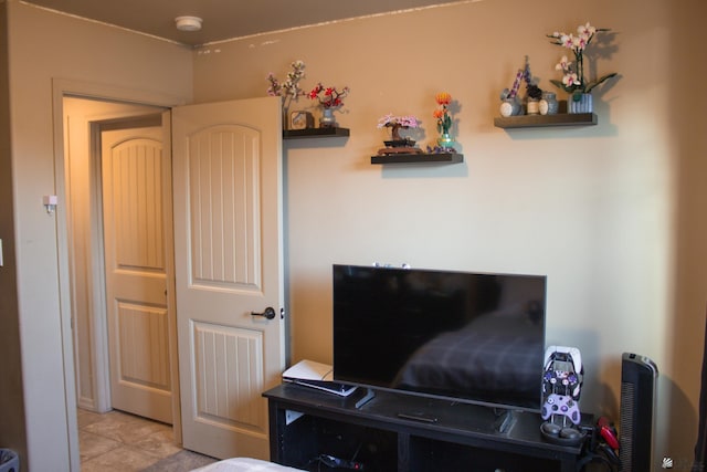 bedroom with tile patterned floors