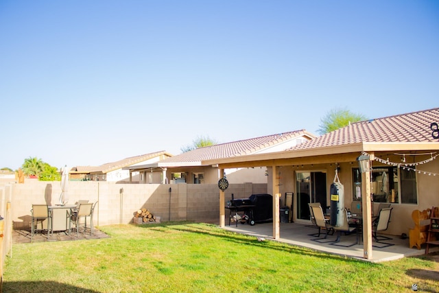 view of yard with a patio and a fenced backyard