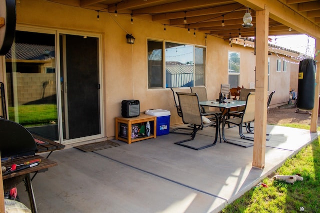 view of patio with outdoor dining area