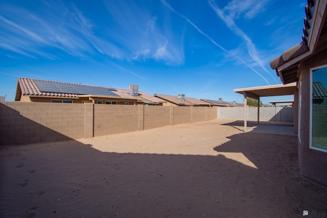 view of yard featuring a fenced backyard and central AC unit