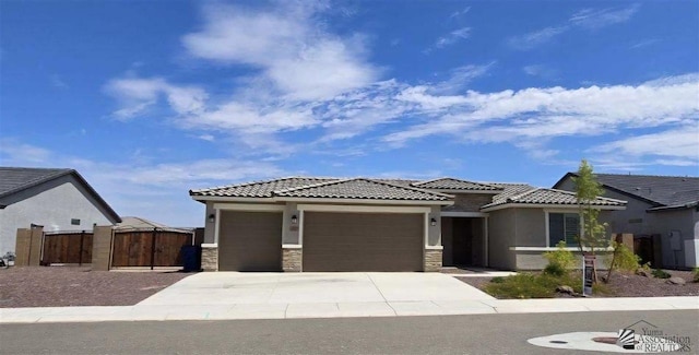 view of front of home with a garage