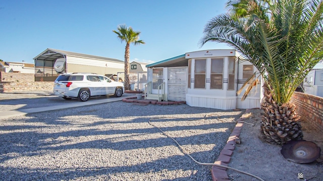 view of front of house featuring a carport