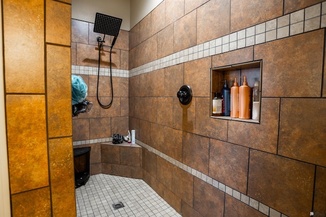 full bathroom with a wood stove and a tile shower