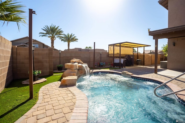 view of swimming pool featuring a fenced in pool, a patio, and a fenced backyard