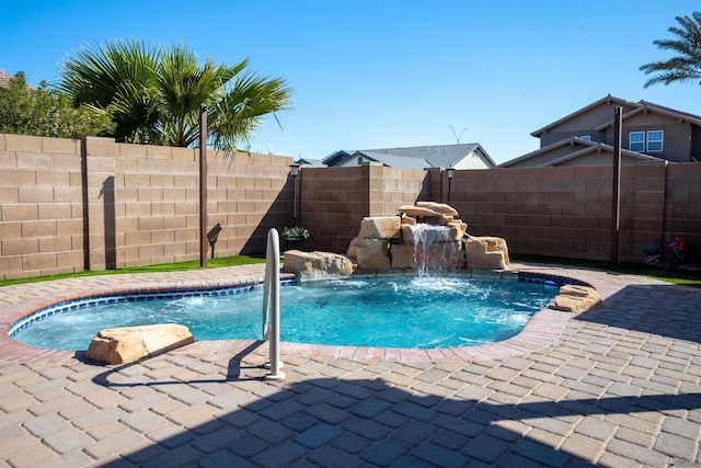 view of pool with a patio, a fenced backyard, and a fenced in pool