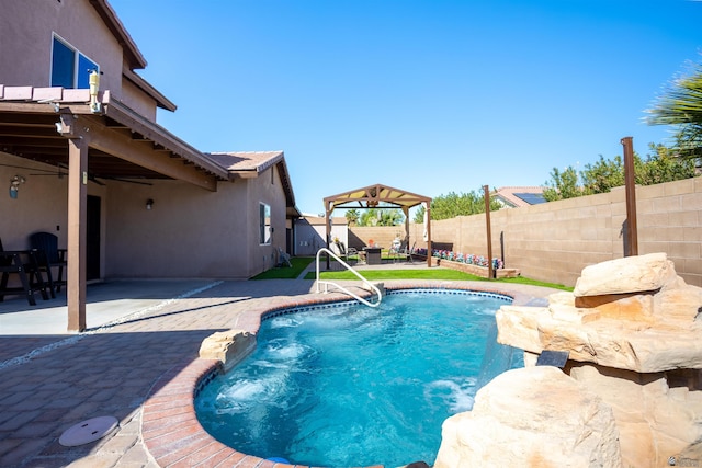 view of swimming pool with a patio area, a fenced in pool, and a fenced backyard