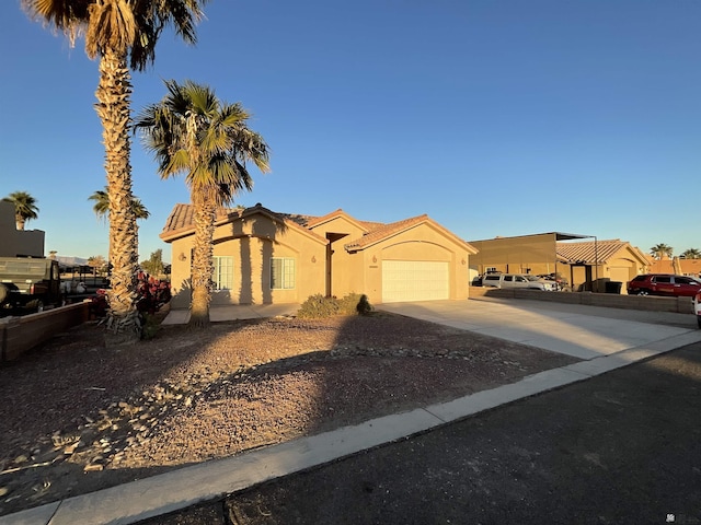 view of front of property featuring a garage