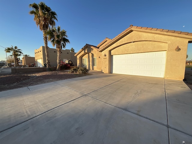 view of front of property with a garage