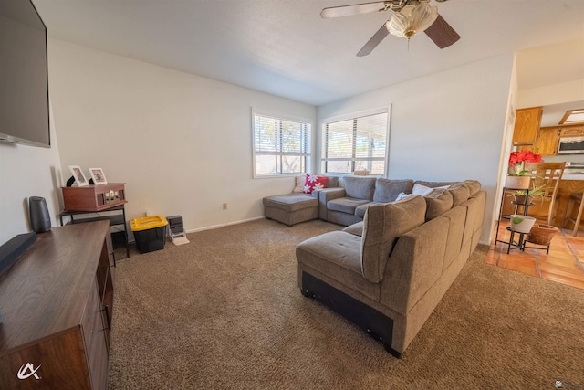 living room with carpet and ceiling fan