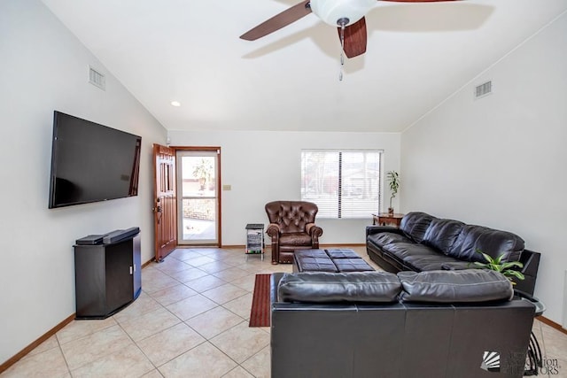 tiled living room with vaulted ceiling and ceiling fan