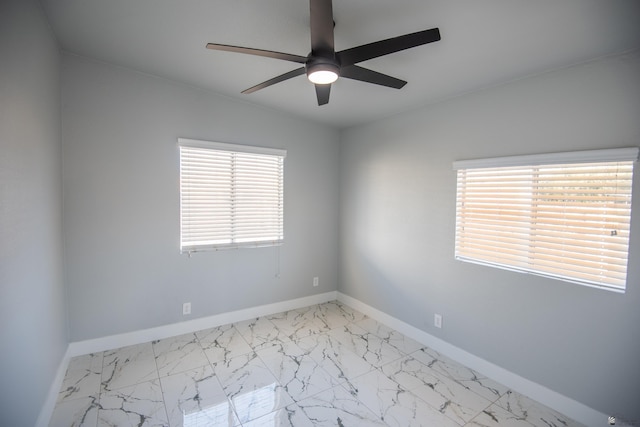 spare room with lofted ceiling and ceiling fan