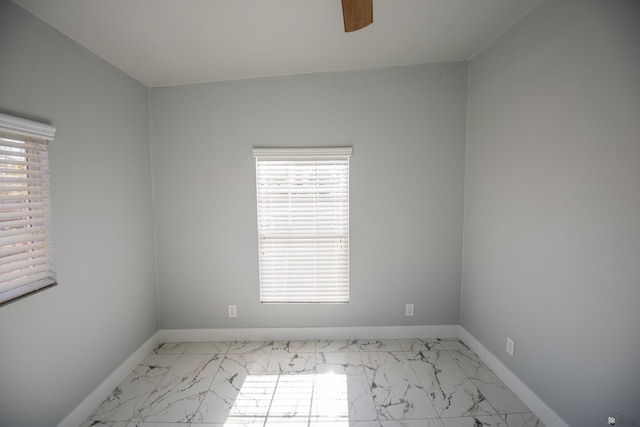 unfurnished room featuring ceiling fan