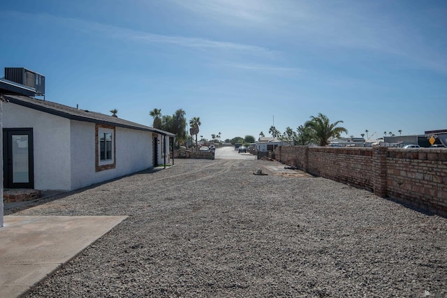 view of yard with central AC