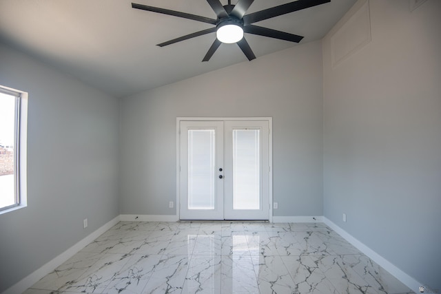 unfurnished room with french doors, ceiling fan, and vaulted ceiling