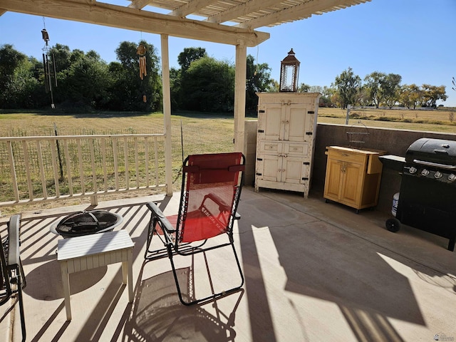 view of patio / terrace featuring grilling area and a pergola