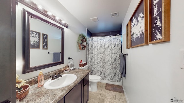 full bathroom featuring toilet, vanity, tile patterned flooring, and shower / tub combo