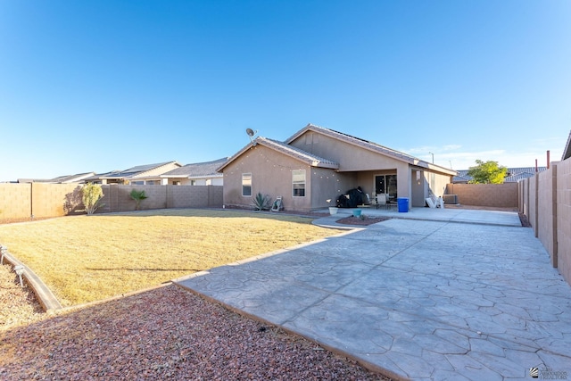 back of house featuring a patio