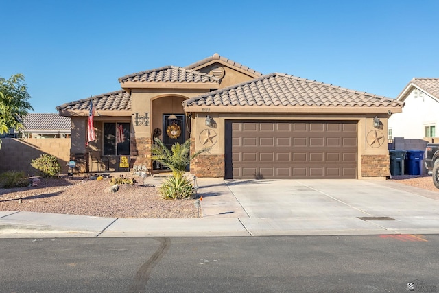 view of front of home with a garage