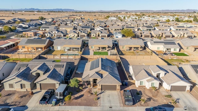 drone / aerial view featuring a mountain view