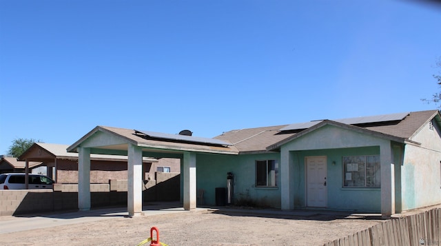 view of front of home with solar panels