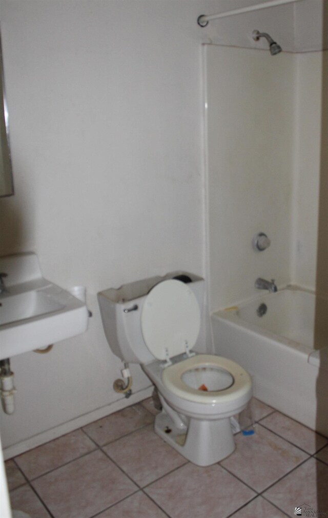 full bathroom with tile patterned flooring, sink, toilet, and shower / washtub combination