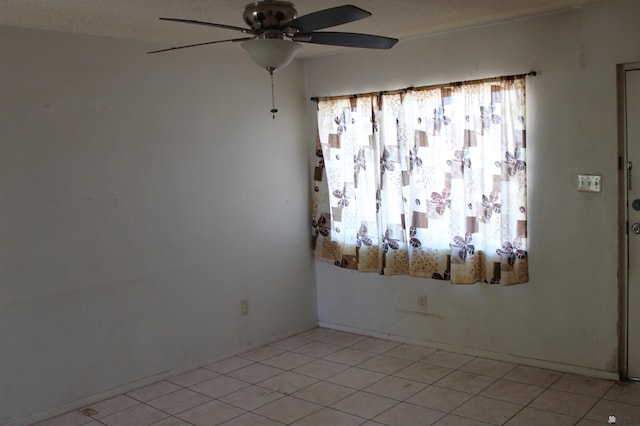 empty room featuring ceiling fan