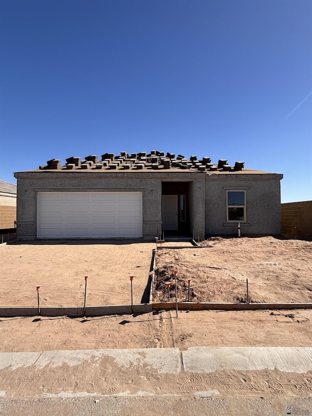 view of front of house with a garage