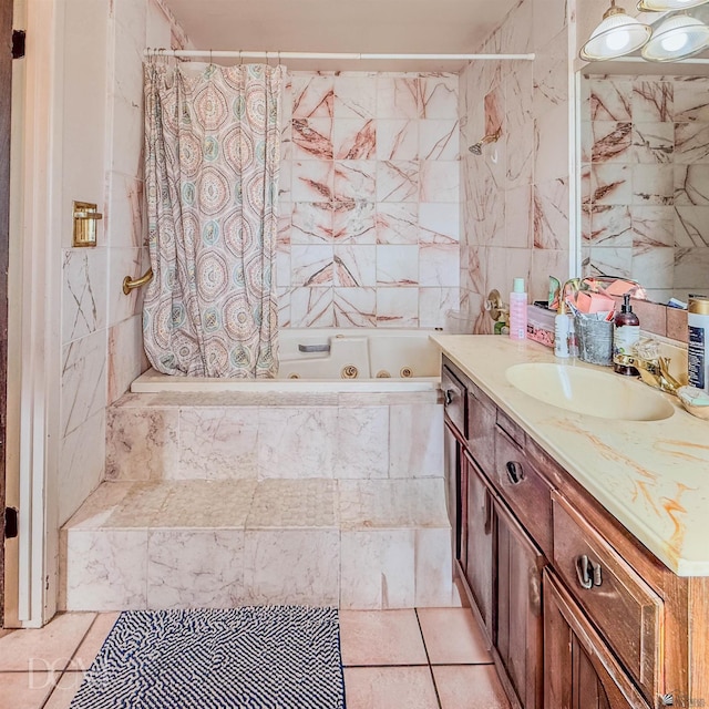 bathroom featuring vanity and tile walls