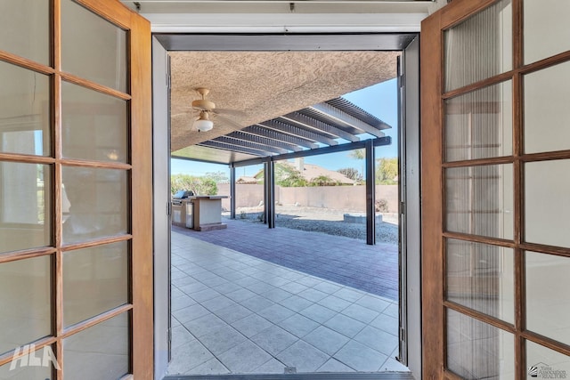 entryway featuring light tile patterned floors