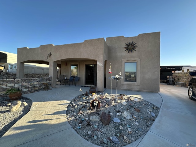 view of front facade featuring a patio