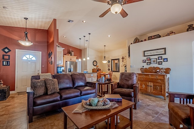 living room featuring high vaulted ceiling and ceiling fan