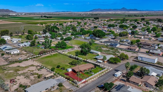 drone / aerial view with a residential view and a mountain view