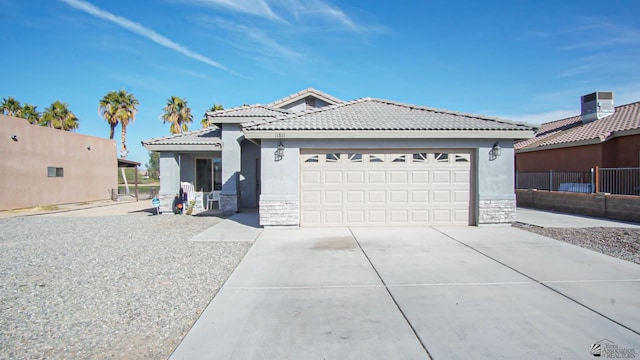 view of front of home with a garage