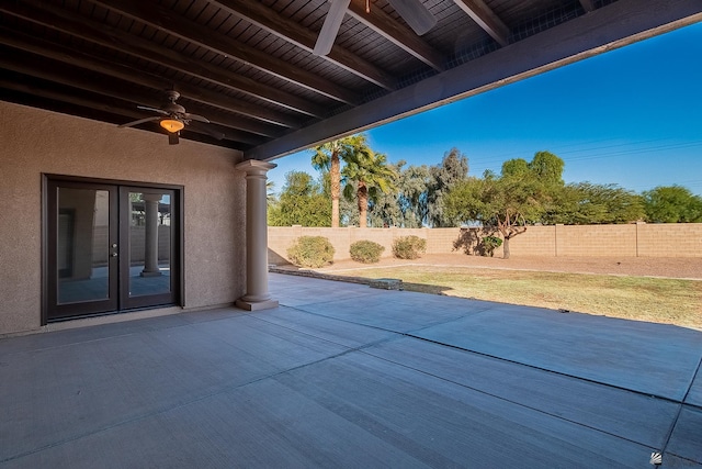 view of patio / terrace featuring ceiling fan and french doors