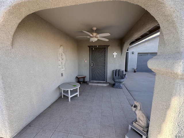 view of exterior entry featuring a garage