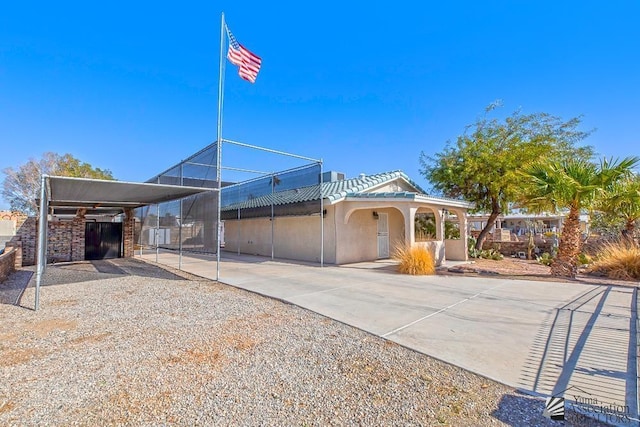 view of front facade featuring a carport