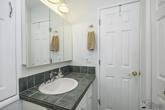 bathroom featuring vanity