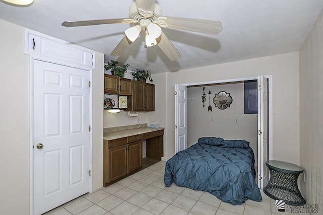 bedroom featuring ceiling fan and light tile patterned floors