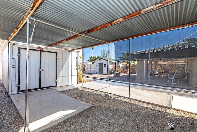 exterior space featuring a storage unit