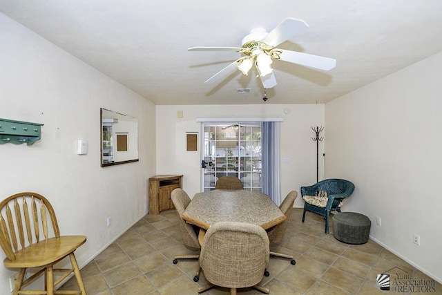 dining space featuring ceiling fan