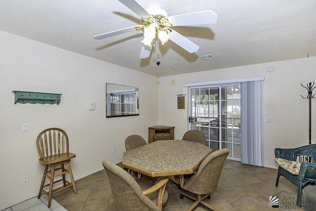 dining area featuring ceiling fan