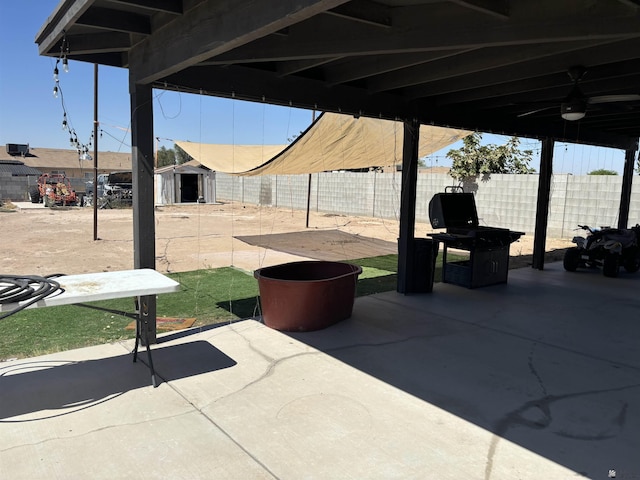 view of patio / terrace with a storage unit